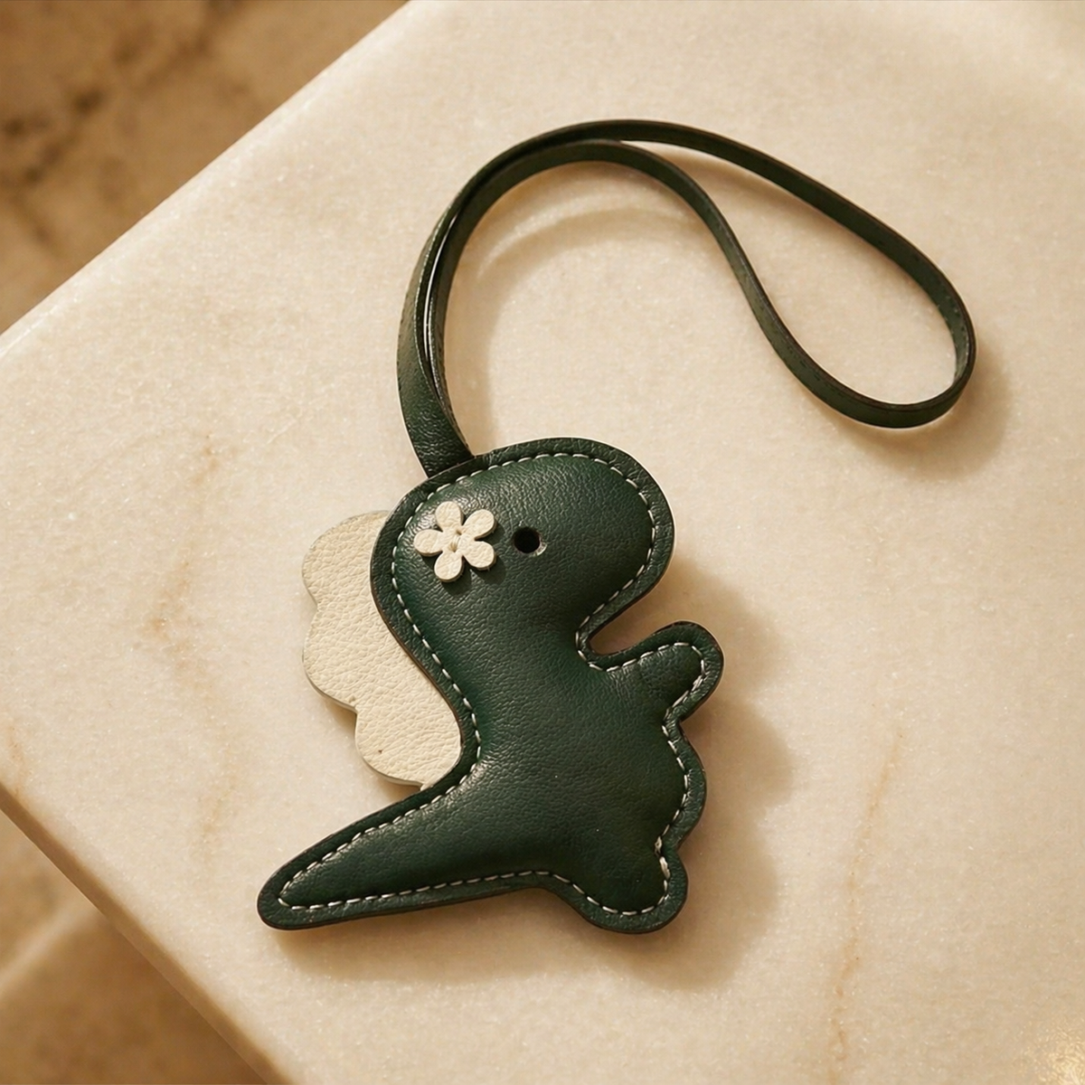 Dinosaur vegan leather bag charm, handmade by Craftelly
