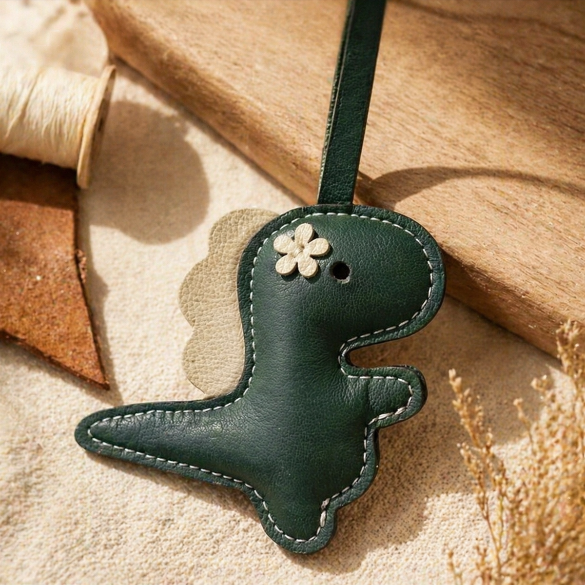 Dinosaur vegan leather bag charm, handmade by Craftelly