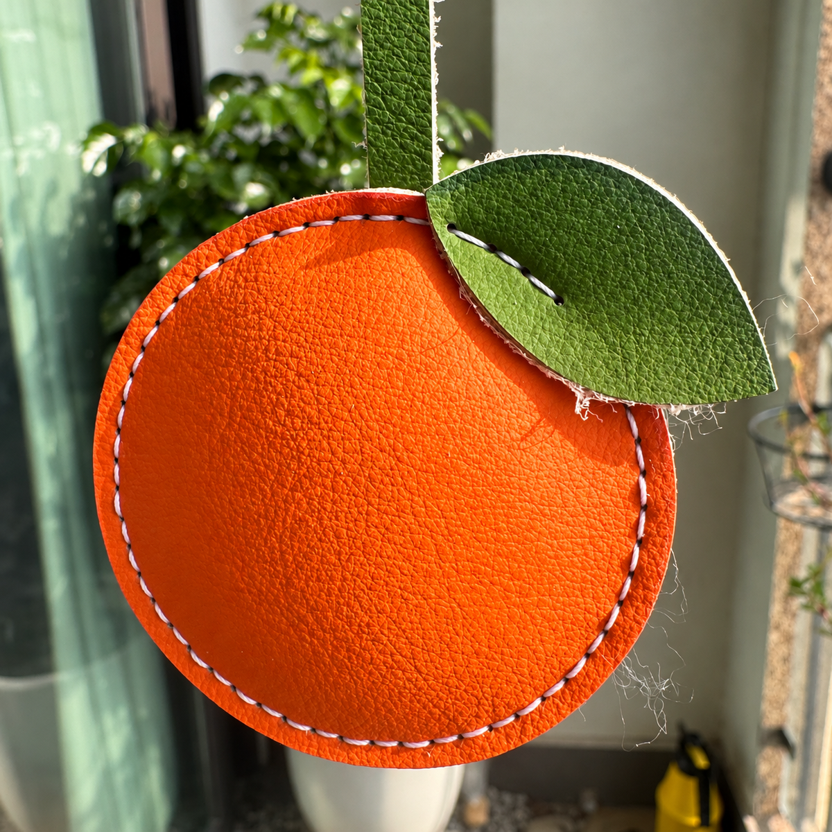 Orange vegan leather bag charm, handmade by Craftelly