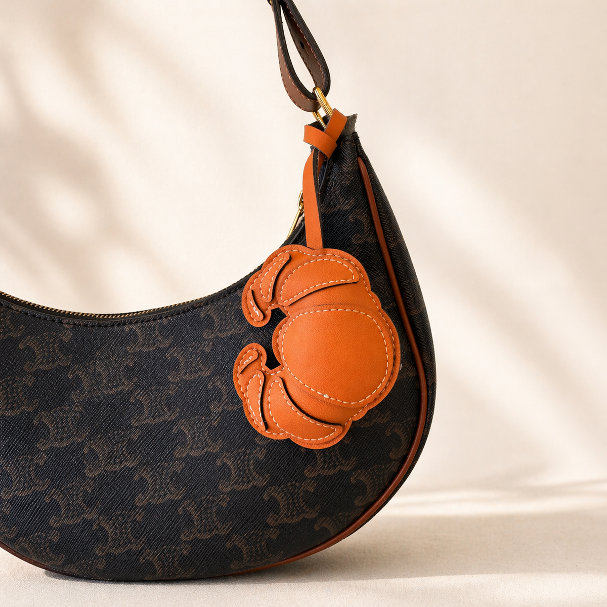 Croissant vegan leather bag charm, handmade by Craftelly
